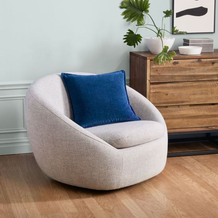 Low swivel sofa chair for cozy seating